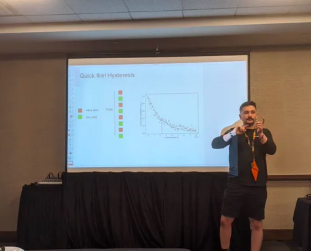 Picture of Jamie speaking at DEFCON