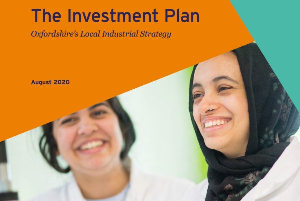 The Investment Plan image with researchers smiling